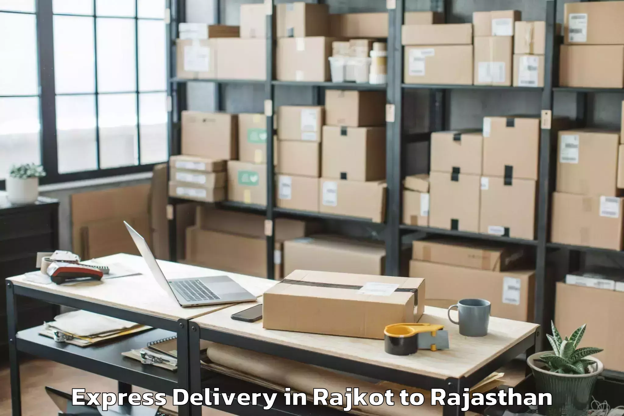 Reliable Rajkot to Iihmr University Jaipur Express Delivery